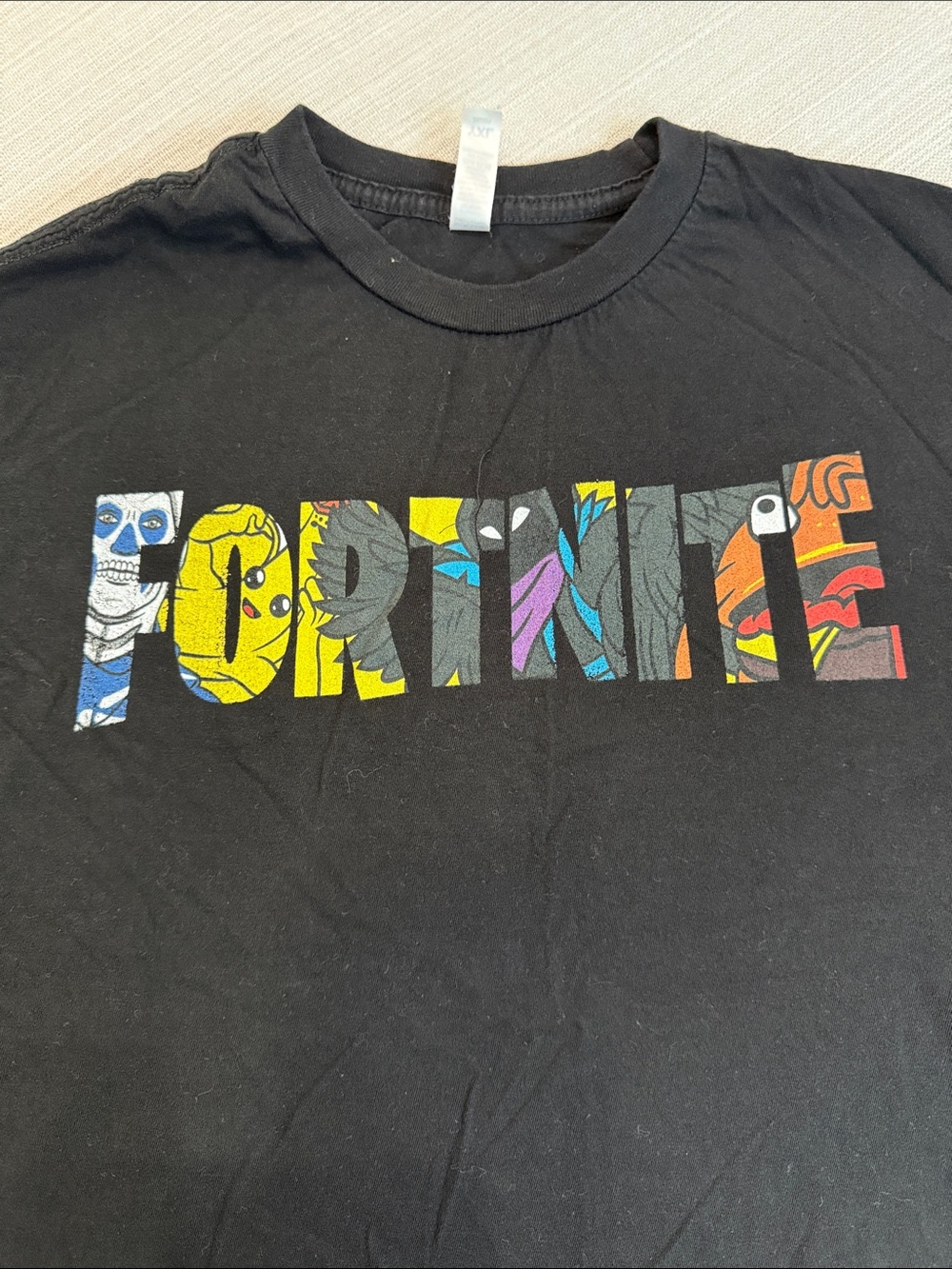 ZUNI SPORTSWEAR Fortnite Graphic Tee in Black with Multicolor Logo YXL